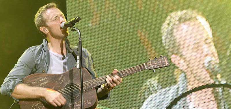 Chris Martin performing with Coldplay