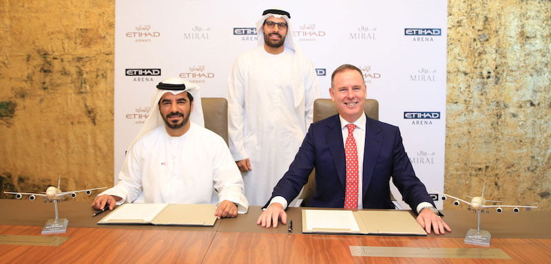 Etihad Arena team. L–R: Al Zaabi, Abu Dhabi tourism department head Mohamed Khalifa Al Mubarak, Douglas