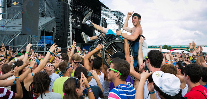 A music fan crowd surfs in his wheelchair during VELD Music Festival in Toronto at Downsview Park August 5, 2012